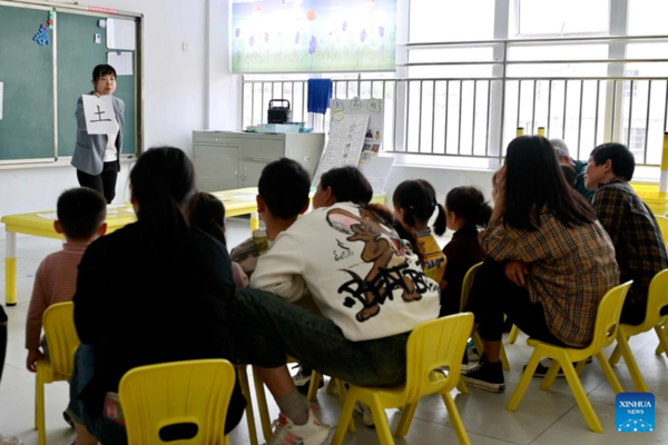 Teacher Guides Children with Autism Toward Bright Futures