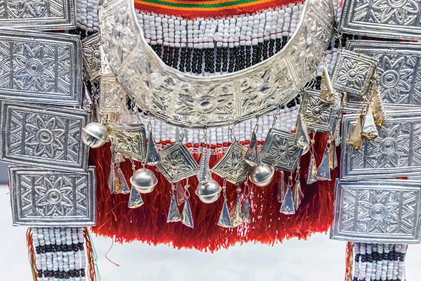 Beliefs Exhibited on Yaos' Splendid Costumes, Adornments