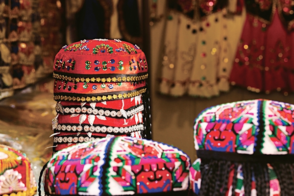Uygurs' Costumes, Adornments Splendid as Summer Flowers