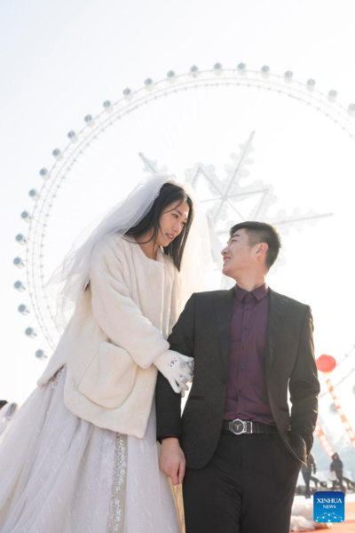 Free Group Wedding Held at Harbin Ice-Snow World
