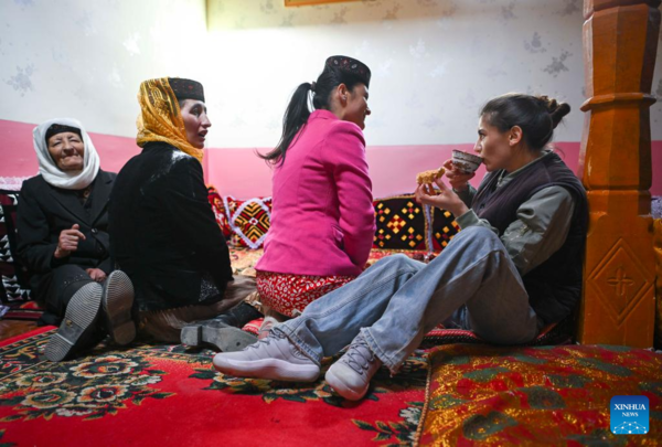 Ethnic Charm of Young Dancer Glows on Stage of Pamir Plateau