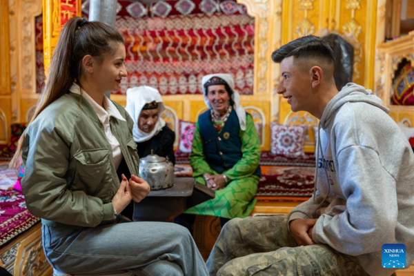 Ethnic Charm of Young Dancer Glows on Stage of Pamir Plateau
